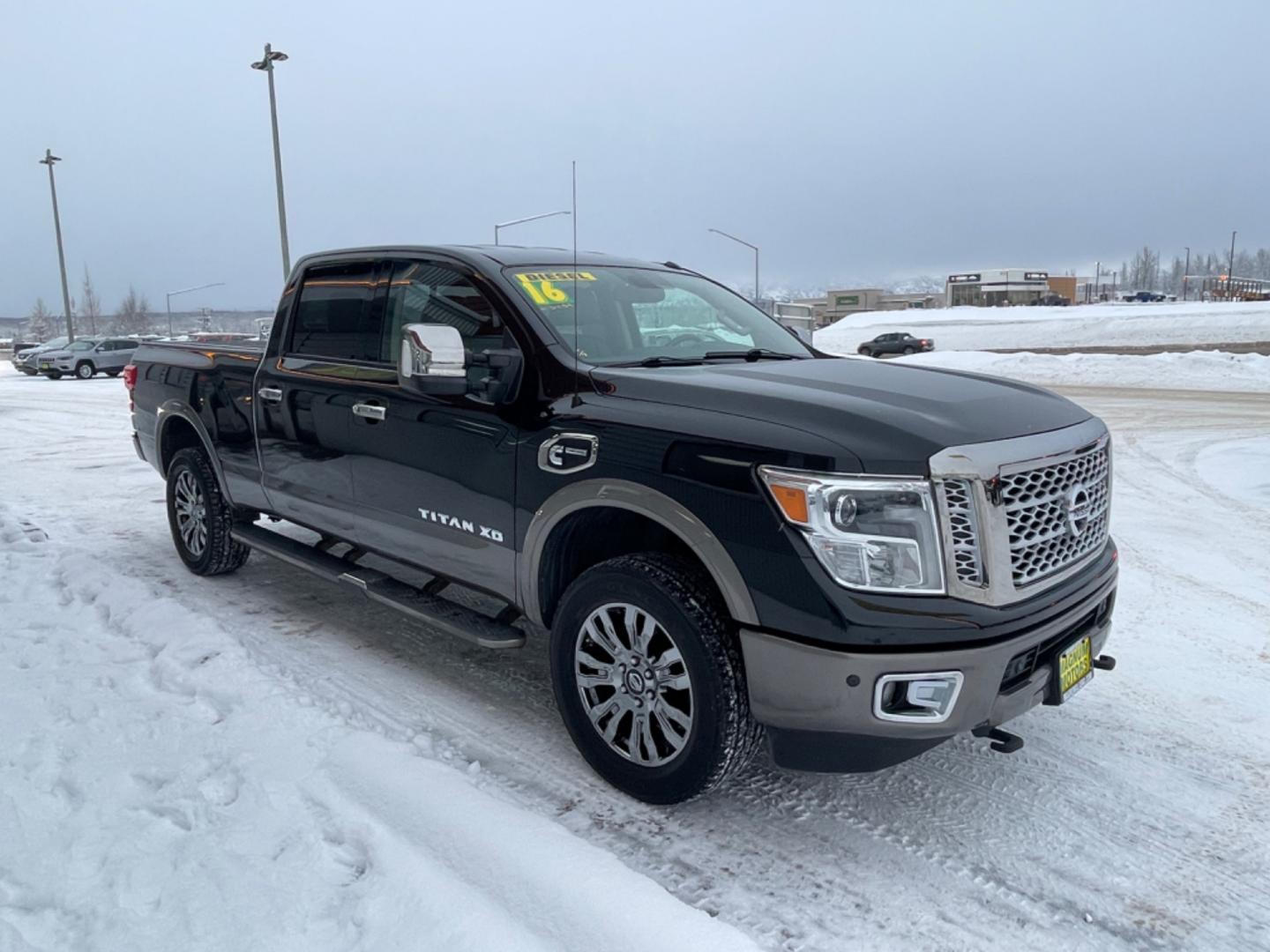 2016 Black /black leather Nissan Titan XD PLATINUM RESERVE 4WD (1N6BA1F46GN) with an 5.0L V8 DOHC 32V DIESEL engine, 6A transmission, located at 1960 Industrial Drive, Wasilla, 99654, (907) 274-2277, 61.573475, -149.400146 - Photo#4